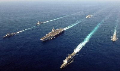 ​一个航母打击群，通常是由几类舰艇编成的？